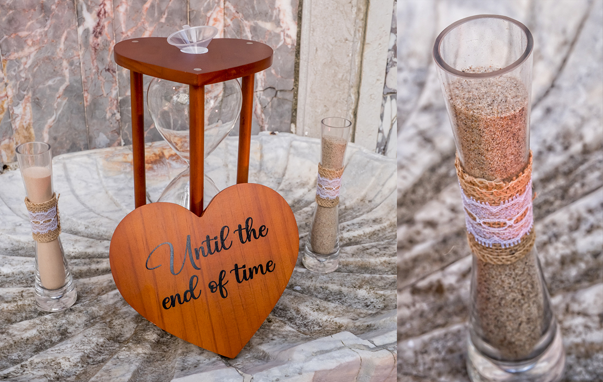 Bride and groom wedding sand ceremony with heart sign reading “Until the end of time” and hourglass at Bonnet House wedding