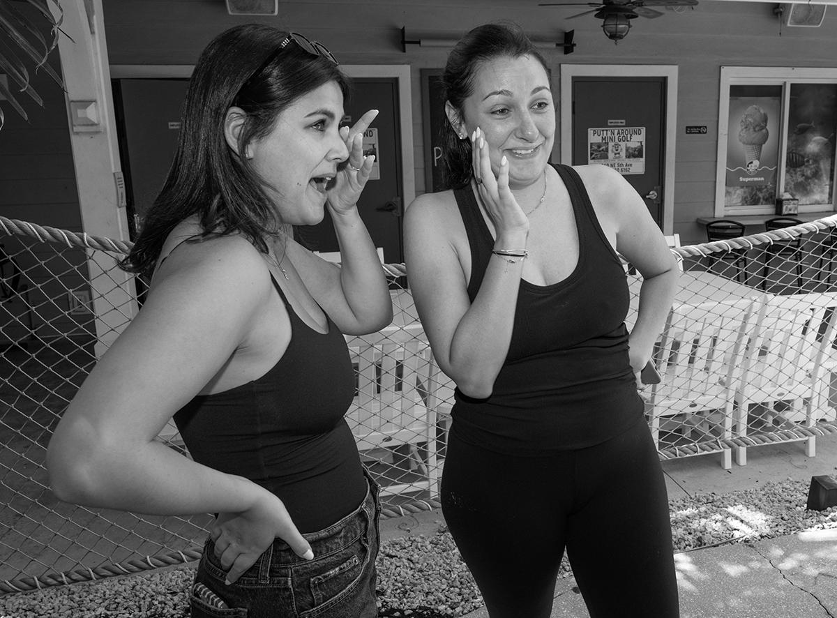 Lauren shares an emotional moment with Jacob's sisters following their surprise marriage proposal at Putt'n Around Delray Beach.