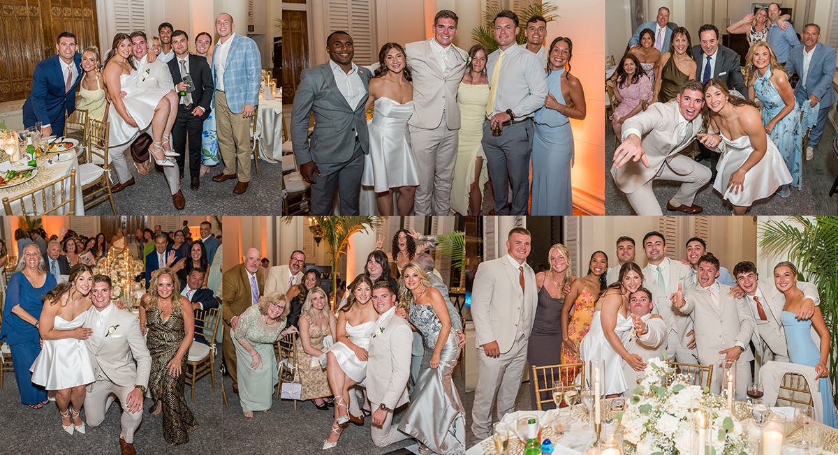 Bride and groom pose with guests during the Photo Blast, visiting every reception table for fast and fun group photographs at their South Florida Catholic wedding.