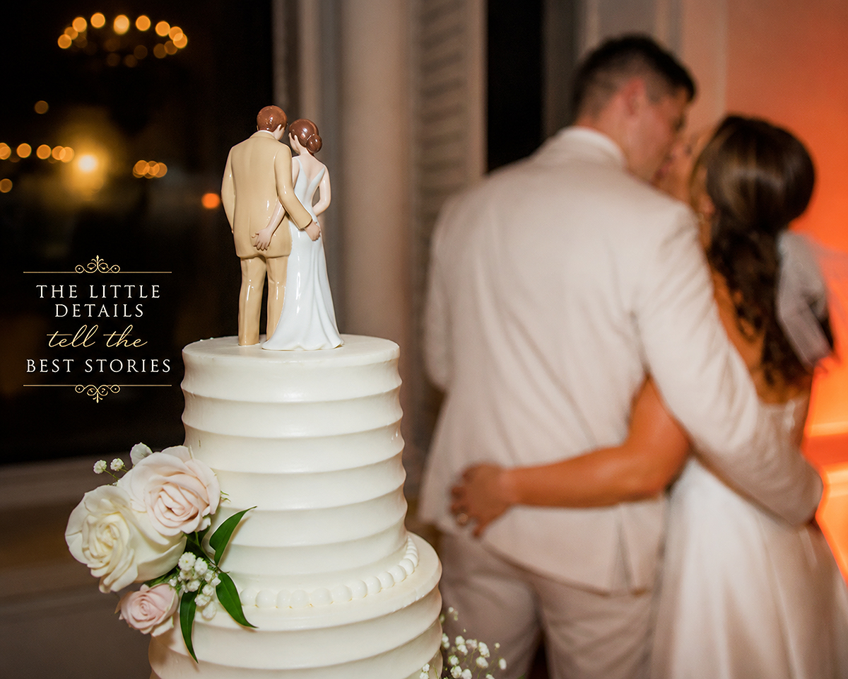 Playful wedding cake topper with porcelain bride grabbing the groom as Catarina and David kiss in the background at The Boca Raton.