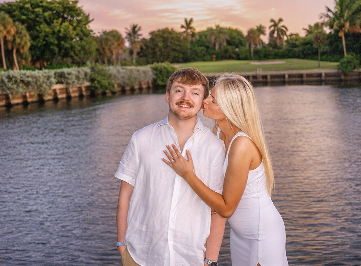 Creative marriage proposal photography of Josh and Rachael at sunset in Boca Raton